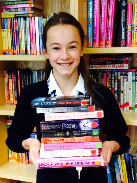 Lydia with her books.