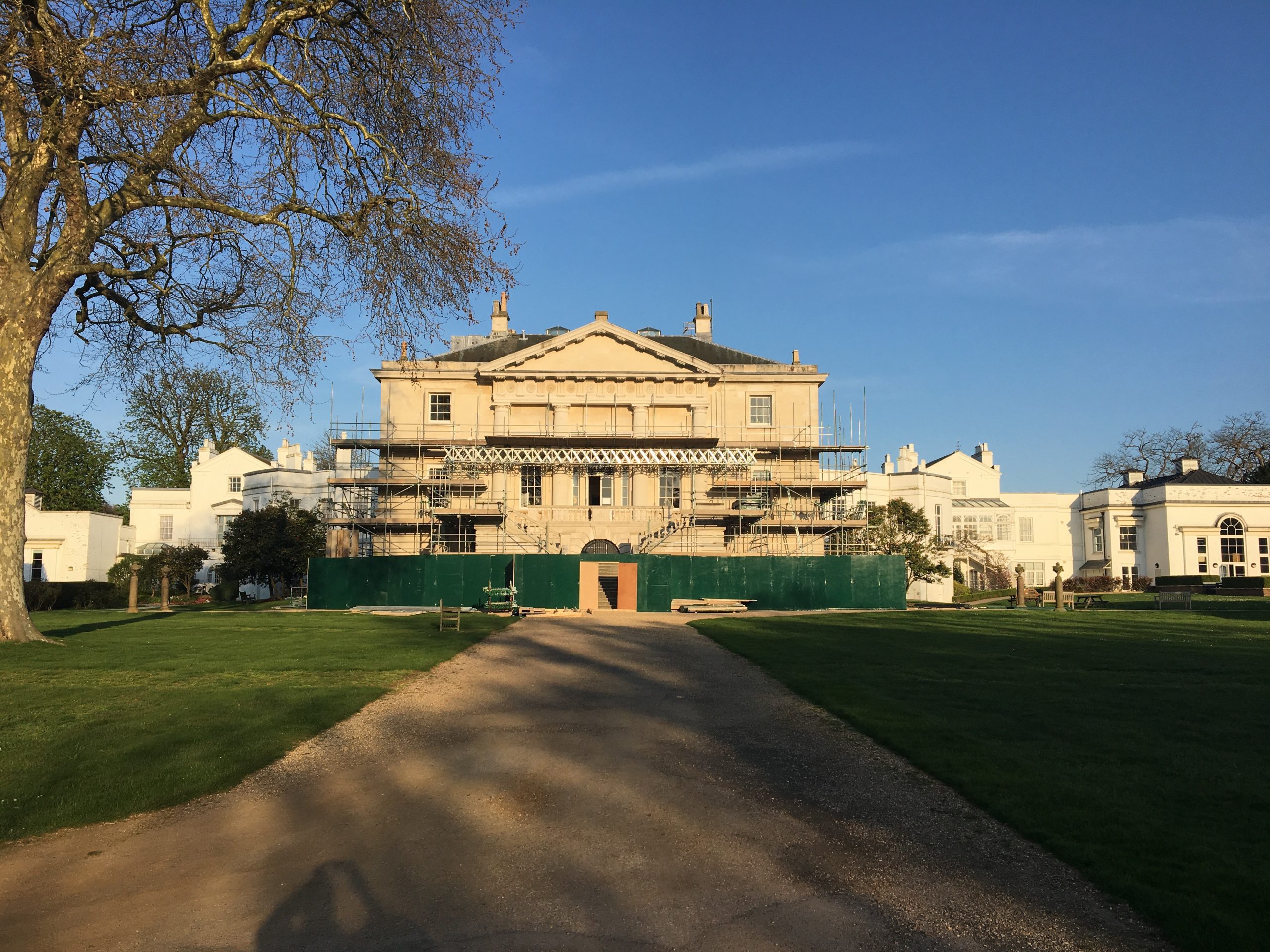 White lodge scaffolding for essential repairs