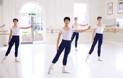 Four boy doing reverence at the end of their class