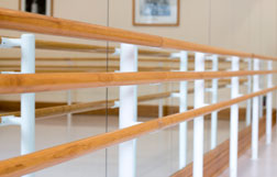 Abstract image of an empty barre in the studio.