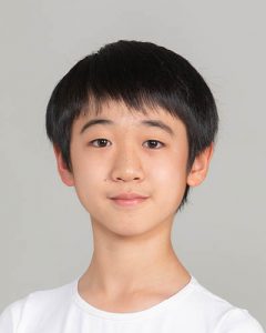 Headshot of International Scholar Rei Kida