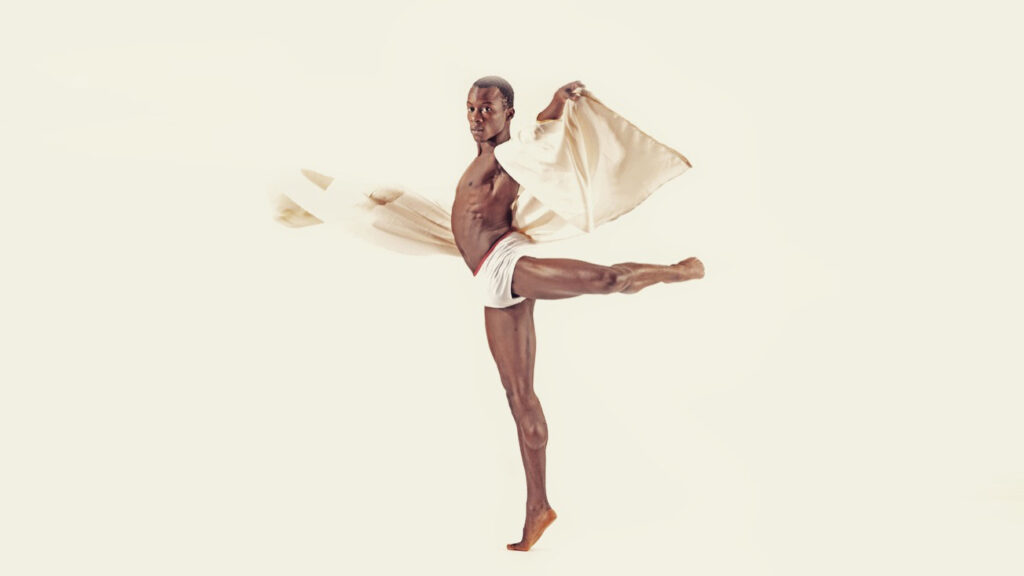 Celebrating black history month Shevelle dynott dancing infront of white background