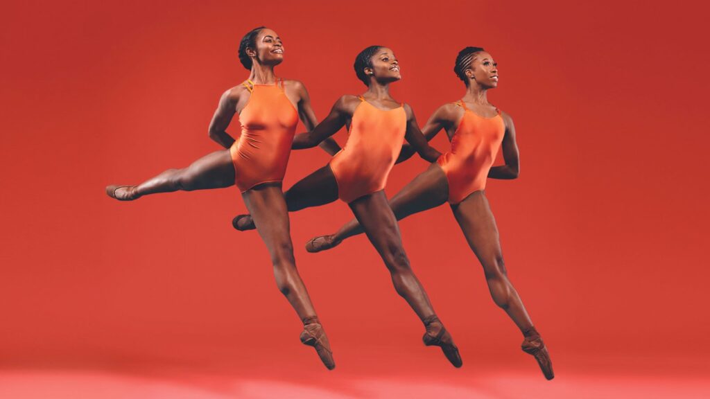 Three dancers leaping in the air on a red background