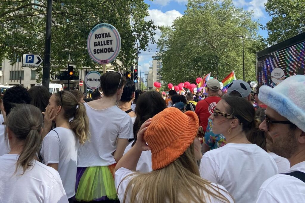Staff and students march in london's pride parade 2023