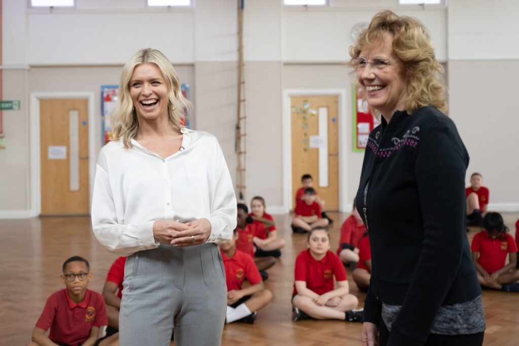 Nadiya and Primary School teacher Mrs Reid smiling at St Anne Line primary