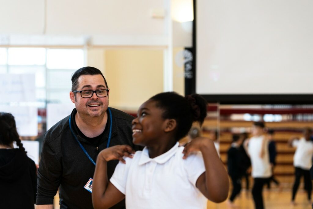 Teacher and primary school dance student in a primary steps on demand class