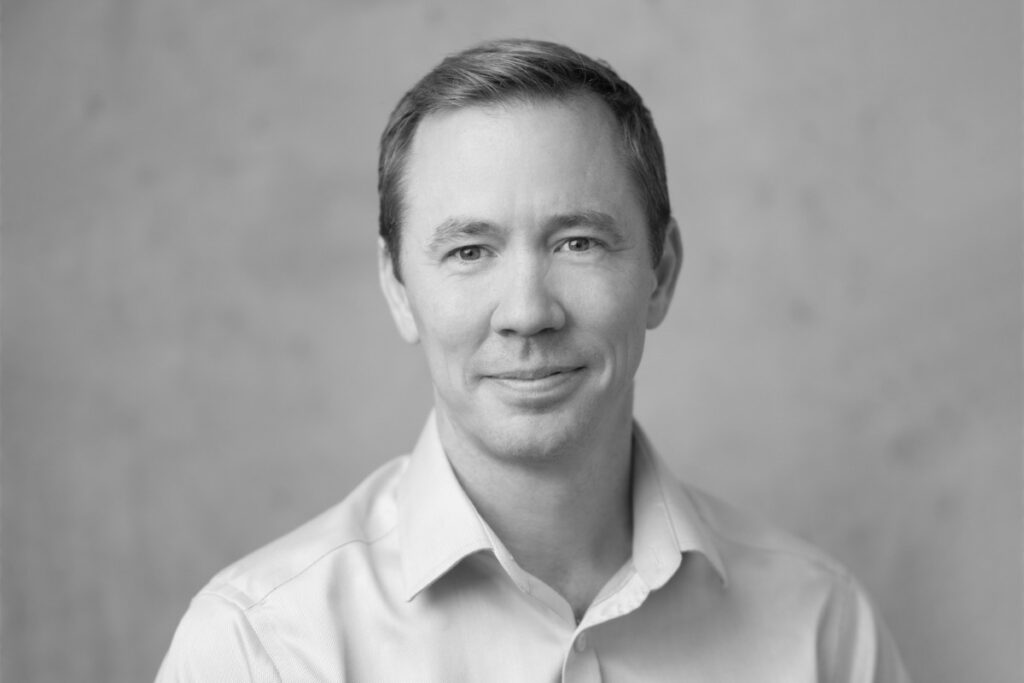 Black and white portrait image of patrick harrison