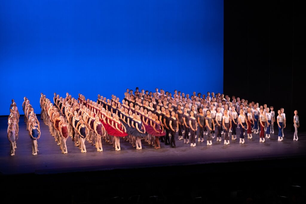 White lodge and upper school students of the royal ballet school on stage at the royal opera house