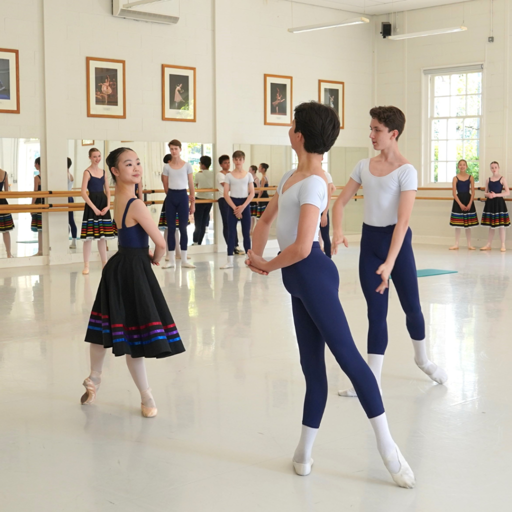 Summer performance spotlight: diana cuni mancini on the legacy of bournonville's napoli Boy and girl facing each other about to begin dancing