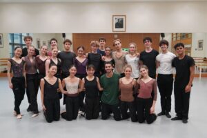 Kele roberson in a group photo with pre-professional students