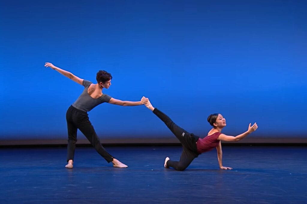‘it felt like there was a subtitle in my heart. ’ the school embraces radical accessibility for world ballet day 2025 Lewis and anzu stretch their limbs on stage
