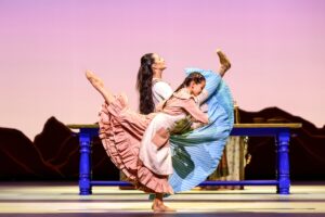 Principal francesca hayward with student ariella in like water for chocolate on stage