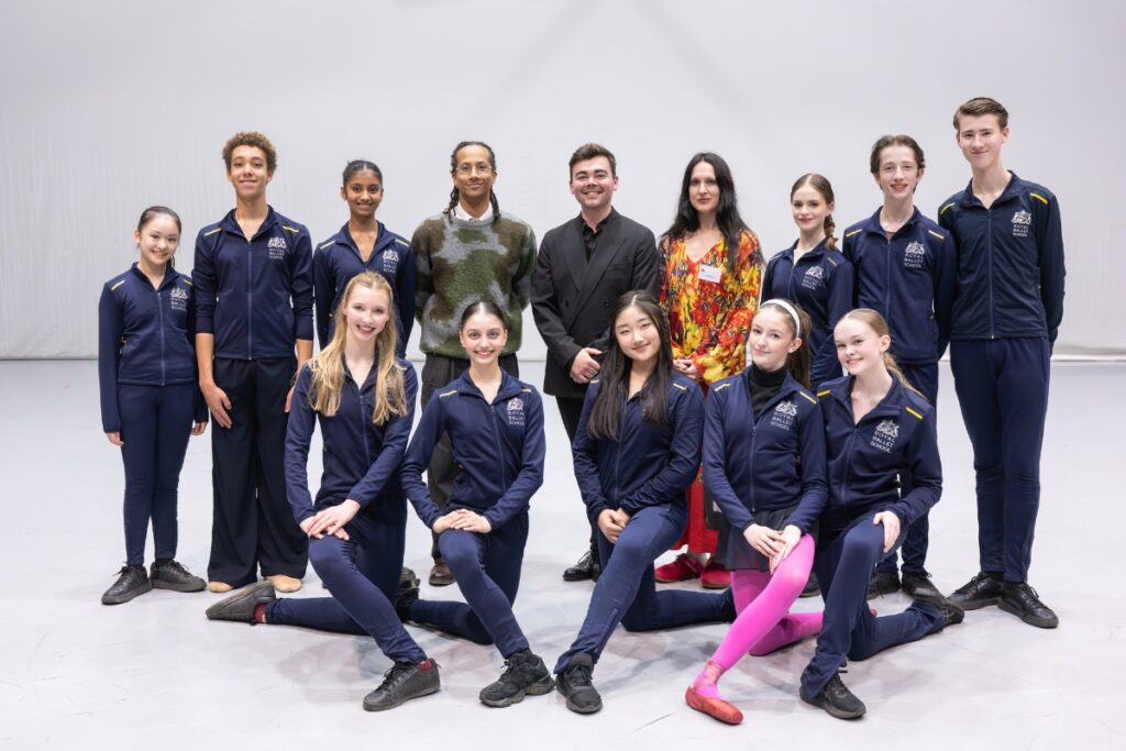 A group photo featuring the ten student choreographers and three guest panelists