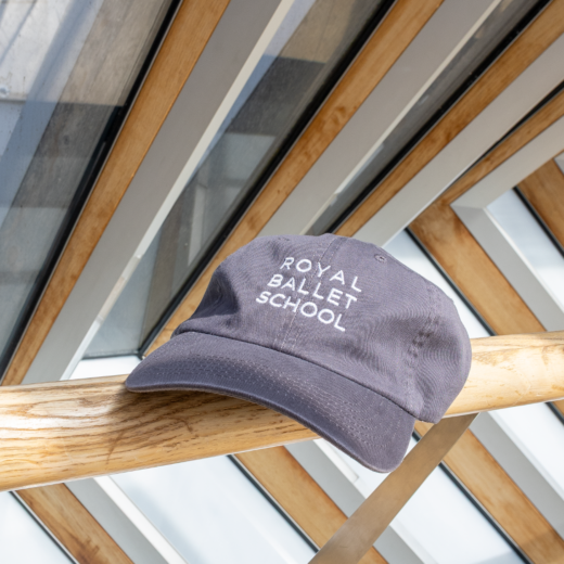 Burgundy cap with ballet school logo