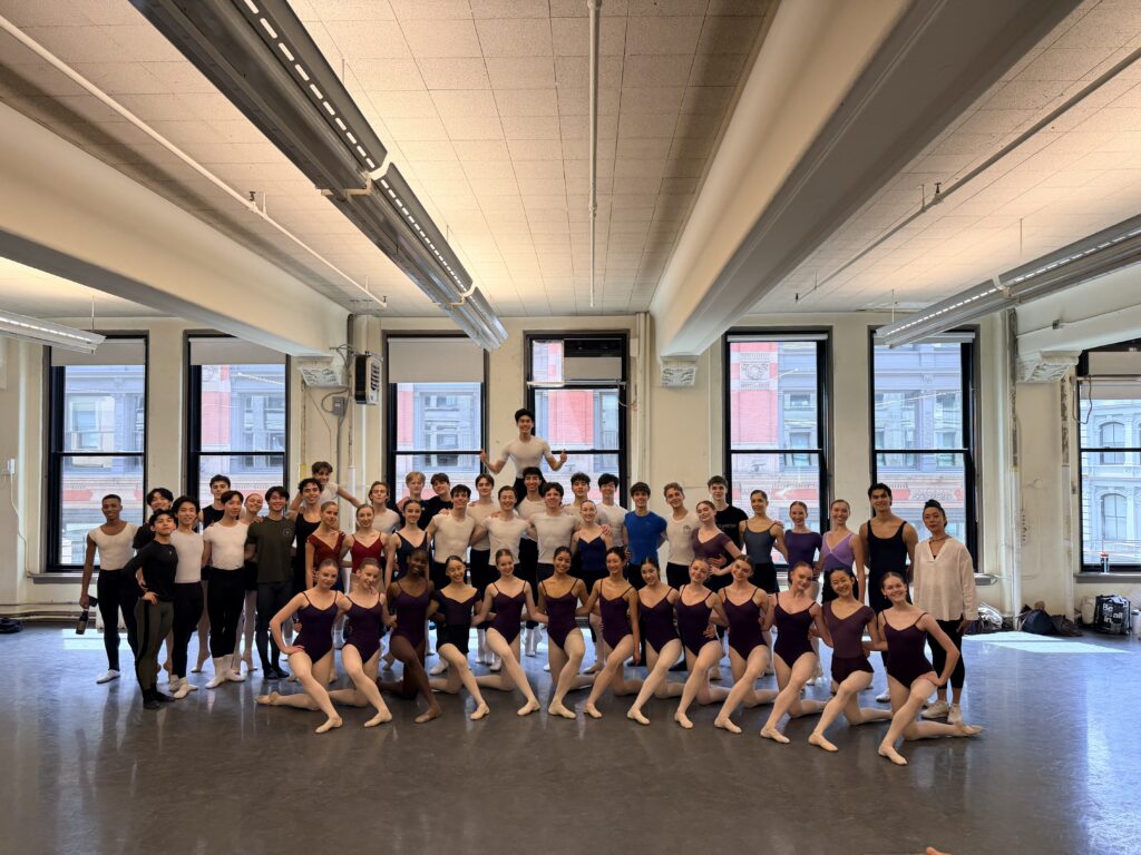 A large group of students pose in the abt jko studio.