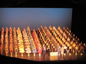 The school in the grand défilé at the royal opera house on 12 july 2009 with then departing chair of governors, david norman. Every student of the school stands in straight lines by class year in uniform.