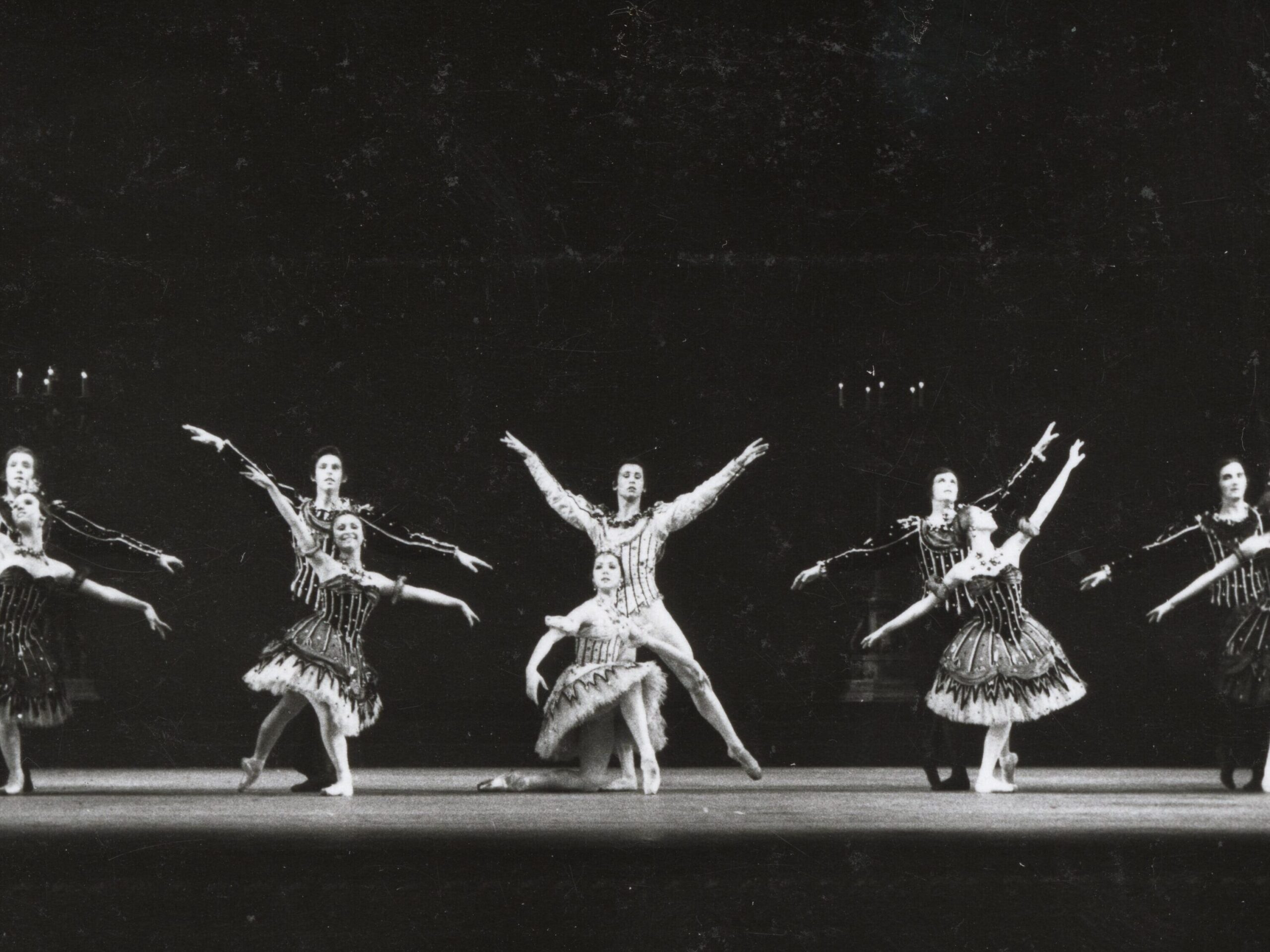 100 stories: karen paisey A group photo of dancers in matching dark striped tutus and tunics in birthday offering.